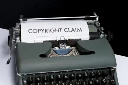 Typewriter with a page saying Copyright Claim